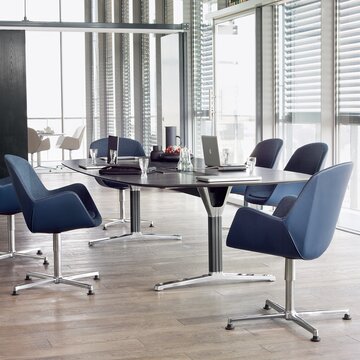 pulse Conference table with blue conference chairs.
