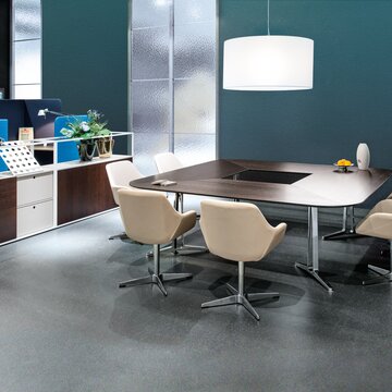 skill system table Conference table with white shell chairs.