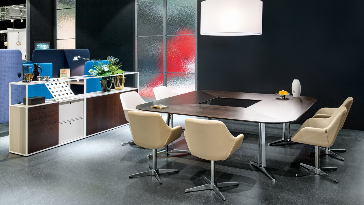 skill system table Conference table with white shell chairs.